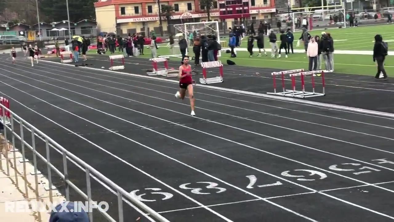Trans student in Portland wins gold in the girls' 400m varsity race.